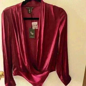 Women’s Sincerely Jules long sleeve body suit NWT size small, burgundy.